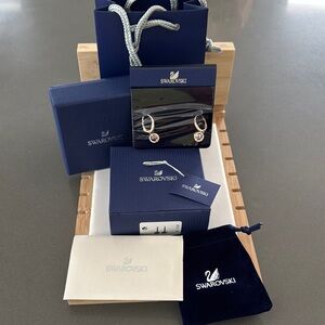 Swarovski NWT Iconic Swan Rose Gold Sparkling Earrings with Box, Dust,Bags.